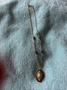 1928 Gold and Black Oval Pendant Necklace